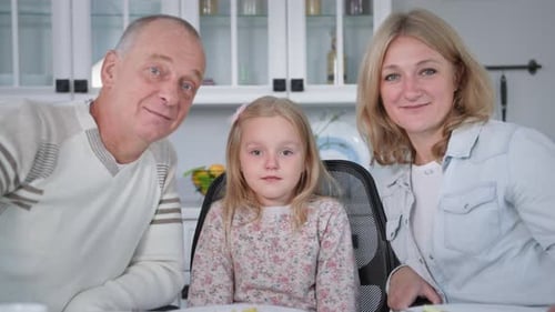 Family Together at the Table Indoors