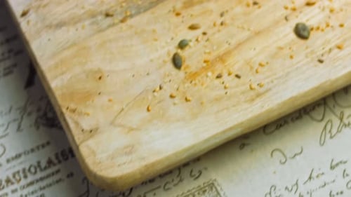 Golden Rustic Bread on Wooden Cutting Board