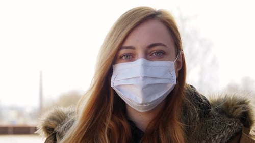 Young Woman Wearing Protective Medical Mask