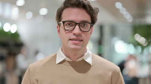 Young Adult Man Screaming in Frustration