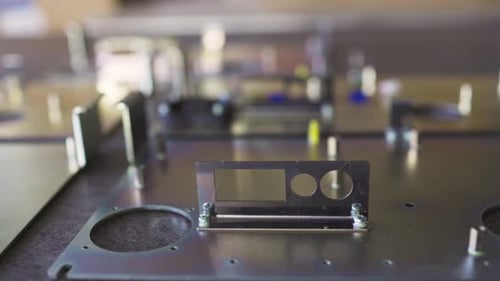Slider Shot of a Blank Metal Components in Workshop Laboratory