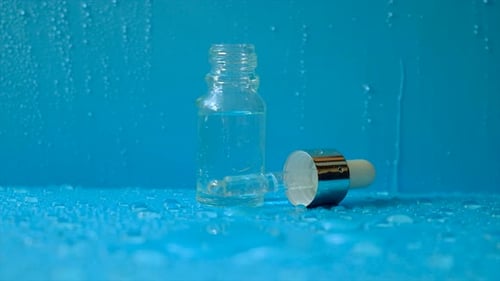 Hyaluronic Acid on a Background with Water Drops