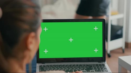 Close Up of Laptop Computer with Mock Up Green Screen Chroma Key Display