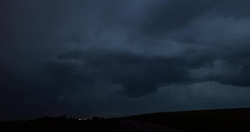 Lightning Strikes in Rural Dark Landscape at Night