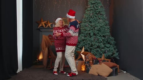 Senior Couple Dancing with Christmas Spirit and Love