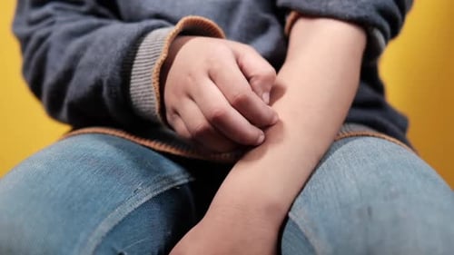 Slow Motion of Child Girl Suffering From Itching Skin Close Up