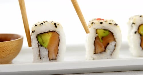 Sushi on tray with sauce