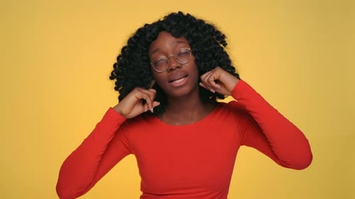 Young Adult Woman Listening to Music