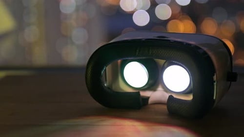 Virtual Reality Headset on Table at Night
