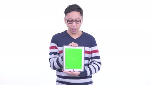 Man Holding Tablet with Green Screen, Chroma Key