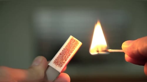 Match Ignites with Fiery Flame in Macro Shot