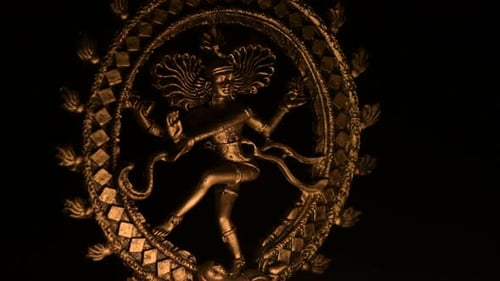 Close Up Of A Gold Religious Statue