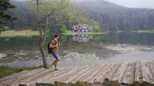 Man walking in nature park.