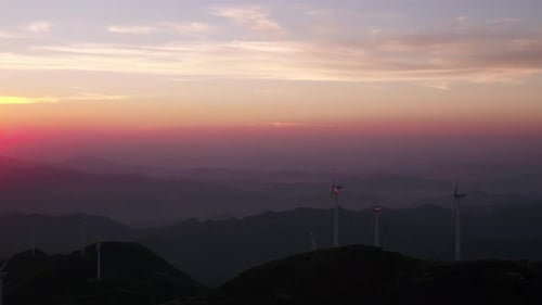 Wind Turbines in mountain during sunset