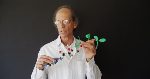 A biology science teacher educating via remote learning online classes to school students with a mod