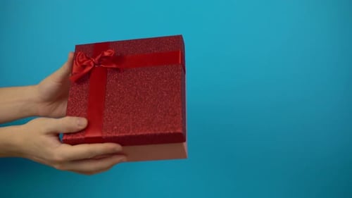 Red Gift Box Exchange on Blue Background