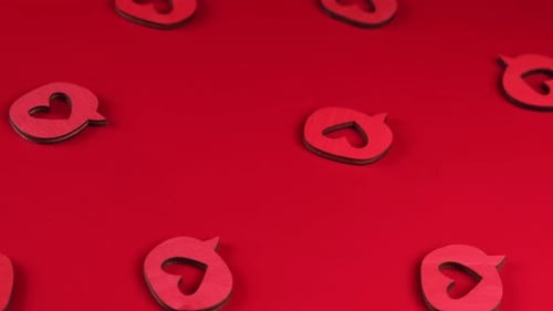 Heart Shaped Speech Bubbles on a Red Background