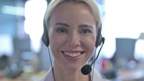Close Up of Female Call Center Employee Talking with Customer