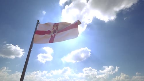 Waving Northern Ireland Ulster Banner Flag Against Sunny Sky