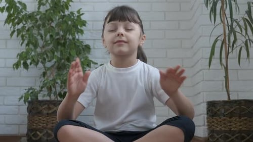 Girl Meditating at Home