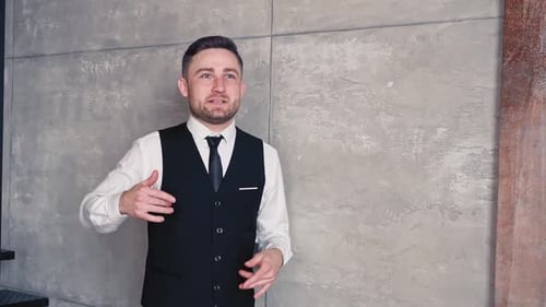 Handsome Adult Man Gesturing Indoors