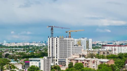 Cityscape Time Lapse, Large Tower Cranes Build Multi-storey Buildings