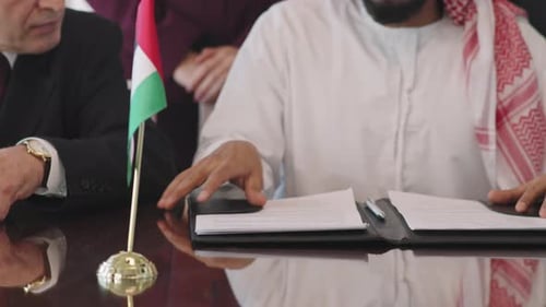 International Agreement Signing at a Conference Table