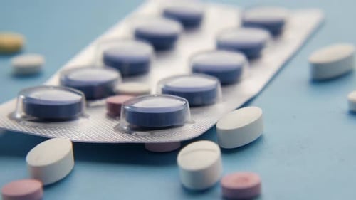 Close Up of Pills of Blister Pack on Table