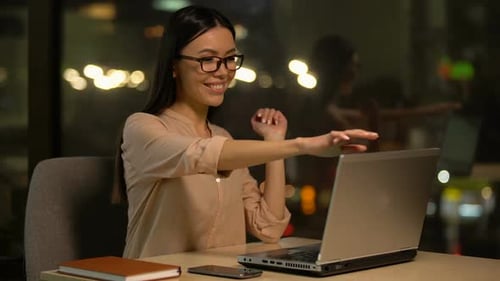 Girl Closing Laptop and Meditating at Workplace, Restorative Exercises in Office