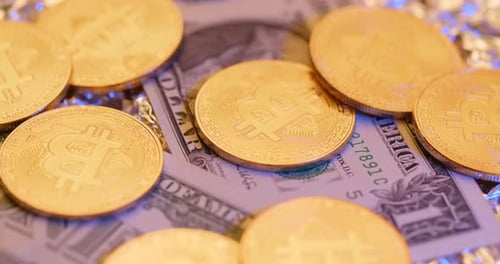 Golden Bitcoins Scattered on One Dollar Bill