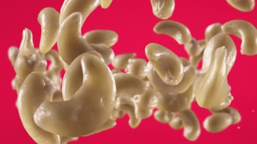Dynamic 3D Cashew Nuts Falling Animation