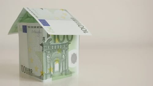 Slow tilt on real estate building concept with EU paper money 4K 2160p 30fps UltraHD footage - Cl