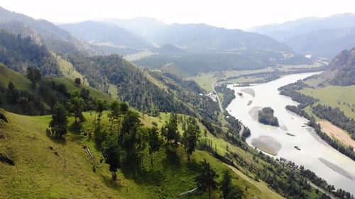 Aerial Point of View. Horizontal Panorama Green Mountains of Altai Against the Backdrop of the
