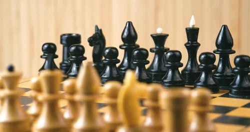 Chess Pieces on Chessboard Strategy Game
