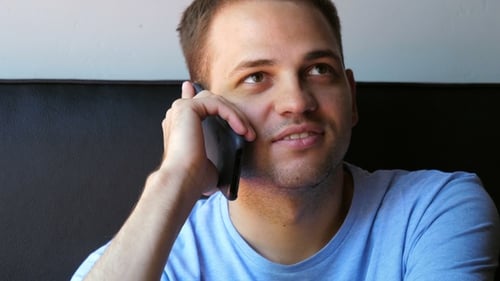 Man Talking on Smartphone in Close Up