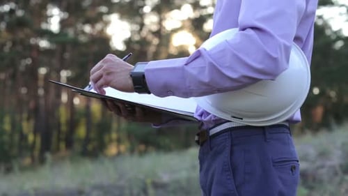 Construction Engineer Makes Notes on your Tablet