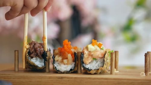 Sushi and Traditional Japanese Food on Table with Copy Space