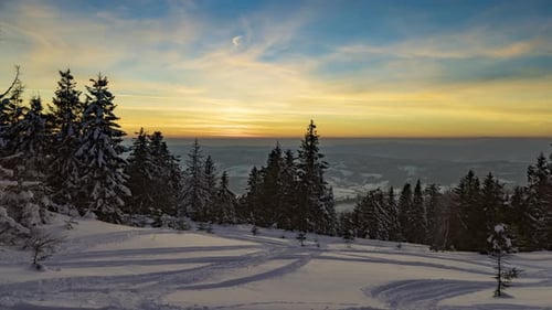 Sundown Time Lapse in Winter Mountain