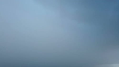 Ominous Dark Clouds Moving Across a Dramatic Sky