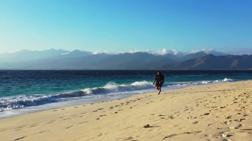 One woman tanning on marine sea view beach time by blue green sea with white sand background of the