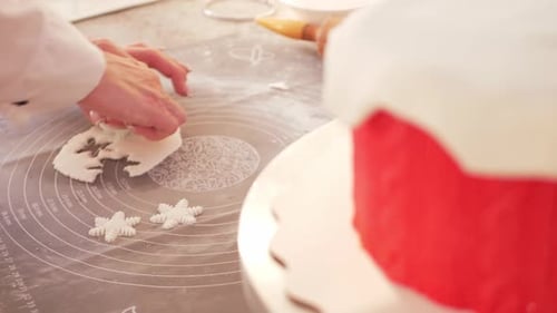 Pastry Chef Decorates Cake Snowflakes and Snow