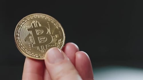 Gold Bitcoin Spins Close Up