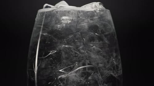 Ice Cubes in Glass With Condensation Close Up