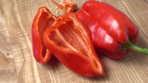Close Up of Bright Red Bell Pepper on Board