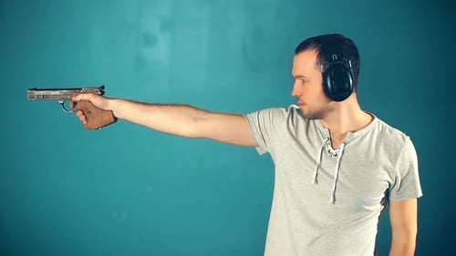 Man Shooting with Gun
