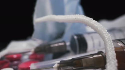 Medical Syringes and Vials Close-Up