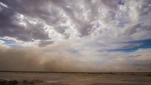 Dramatic Desert Dust Storm Sweeping Arid Landscape