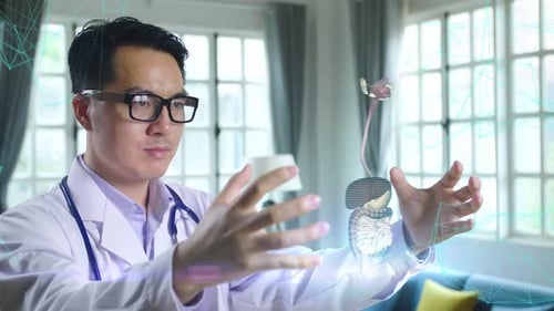 Doctor Manipulates a Digital Medical Hologram Indoors