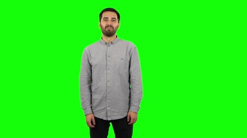 Brunette Guy in Anticipation of Worries, Then Smiling and Proud of Himself. Green Screen