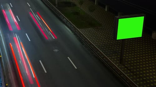Headlights Of Passing Cars At Night, Advertising Billboard, Time Lapse